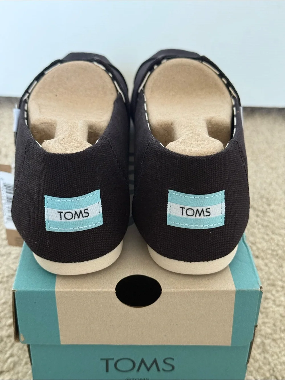 TOMS Black Canvas women’s Slip-On Loafers
